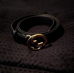 Gucci Elegant Black Belt with Gold Emblem